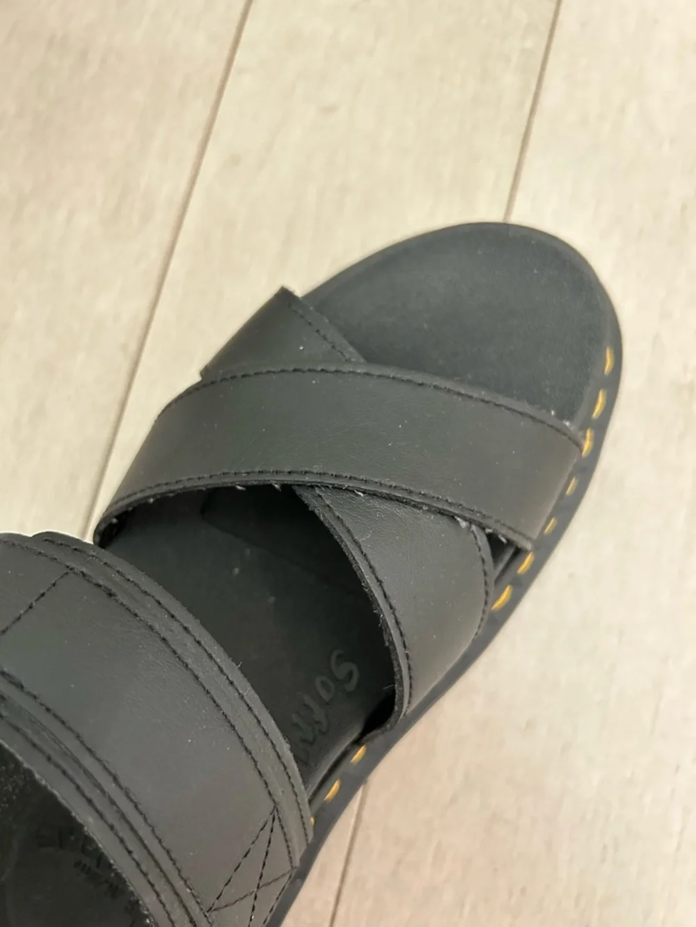 Dr. Martens Black Platform Crisscross Sandals with Yellow Stitching